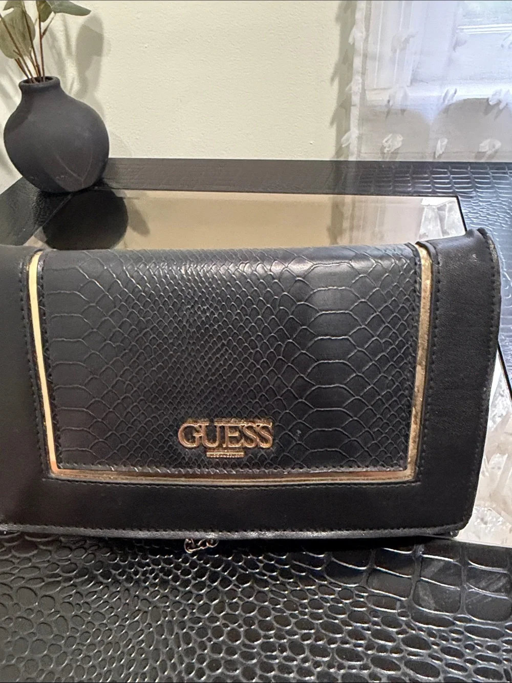 GUESS Black Crossbody Bag with Gold Accents